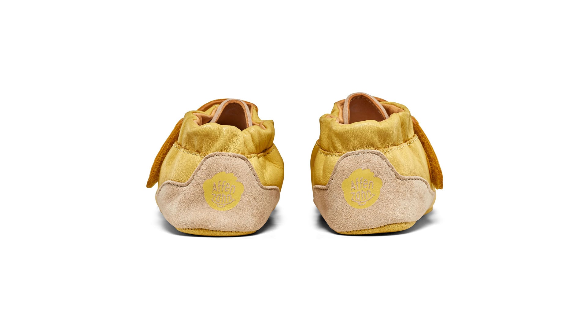 Dětské barefoot capáčky Affenzahn Crawling Shoe Leather Crawly Giraffe
žluté pohled zezadu na paty